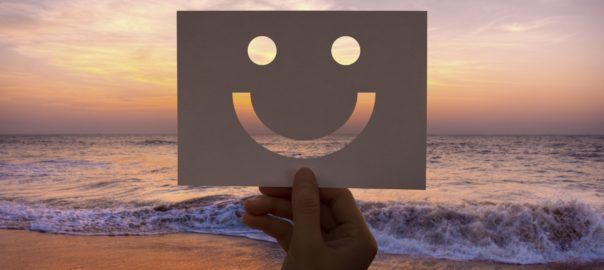 happines cheerful perforated paper smiley face 604x270 - Koniec narzekania